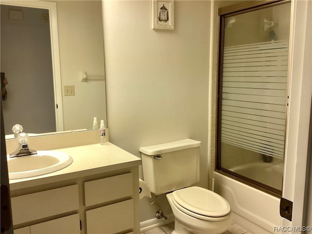 full bathroom featuring tile patterned flooring, vanity, enclosed tub / shower combo, and toilet