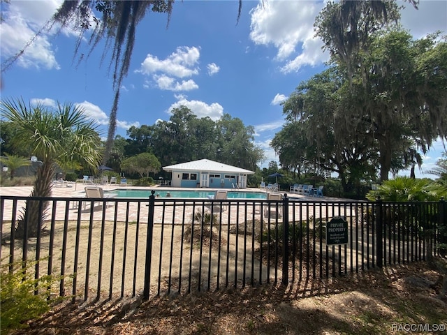 view of pool featuring a patio