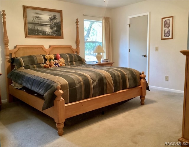 bedroom with light carpet