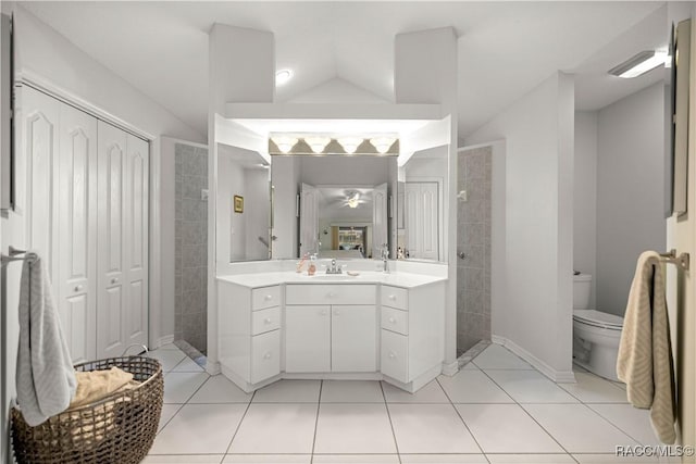 2 Nancy Pkwy, Yankeetown, FL 34498 - full bathroom with vanity, walk in shower, tile patterned flooring, vaulted ceiling, and a ceiling fan