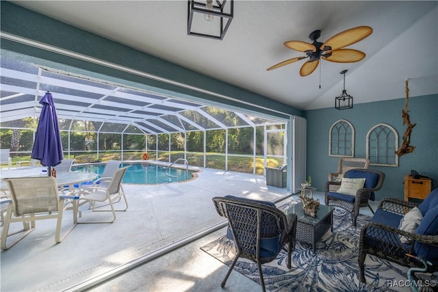 2 Nancy Pkwy, Yankeetown, FL 34498 - swimming pool with outdoor lounge area, ceiling fan, a patio area, and glass enclosure