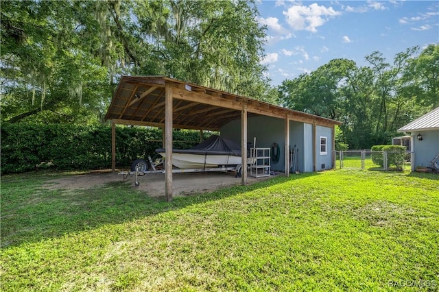2 Nancy Pkwy, Yankeetown, FL 34498 - view of parking / parking lot featuring a carport and view of wooded area