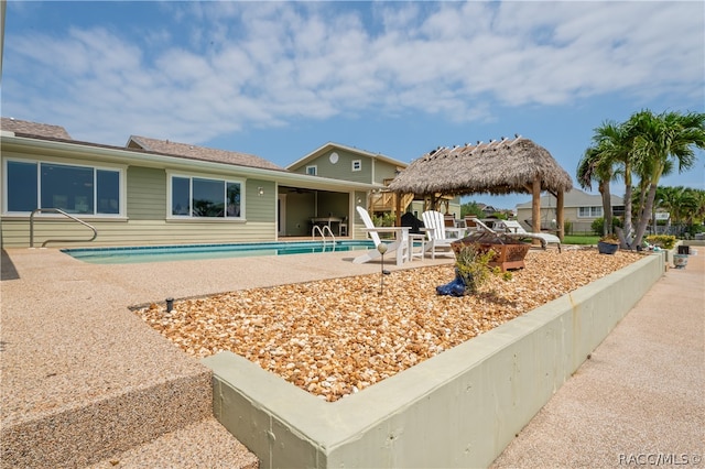 exterior space featuring a gazebo and a patio area