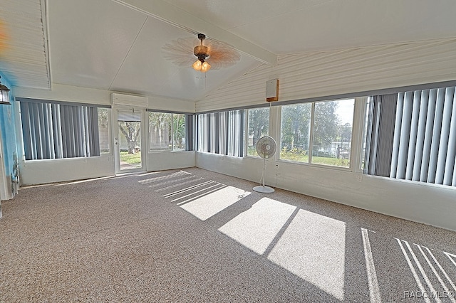 unfurnished sunroom with lofted ceiling with beams, plenty of natural light, and ceiling fan