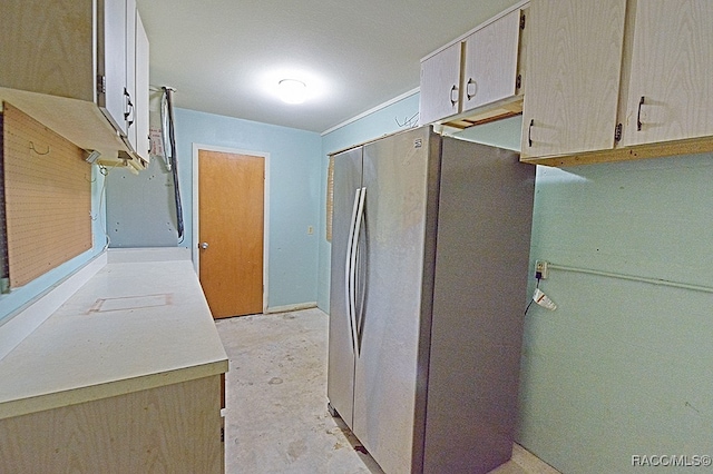 kitchen featuring stainless steel fridge