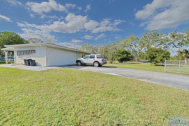 view of side of property featuring a yard