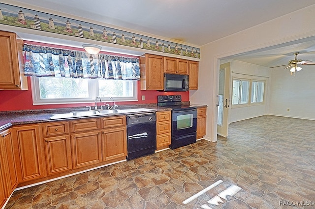 kitchen with black appliances, ceiling fan, and sink