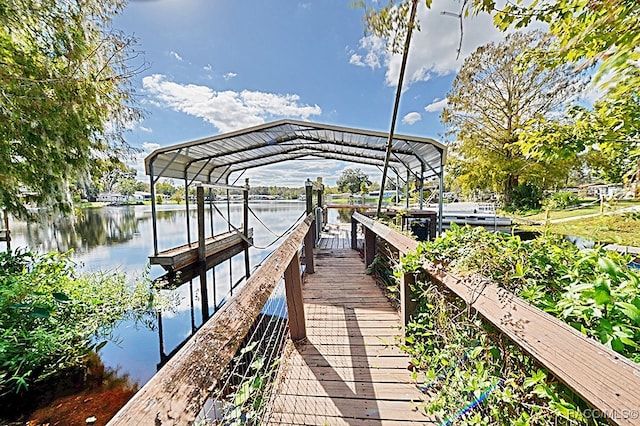 dock area featuring a water view