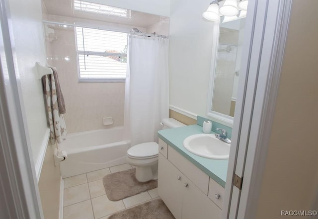 1930 NW 18th St, Crystal River, FL 34428 - full bathroom featuring vanity, shower / bath combo with shower curtain, toilet, and tile patterned floors
