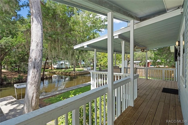 deck featuring a water view