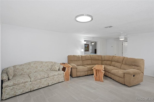 living room with ceiling fan