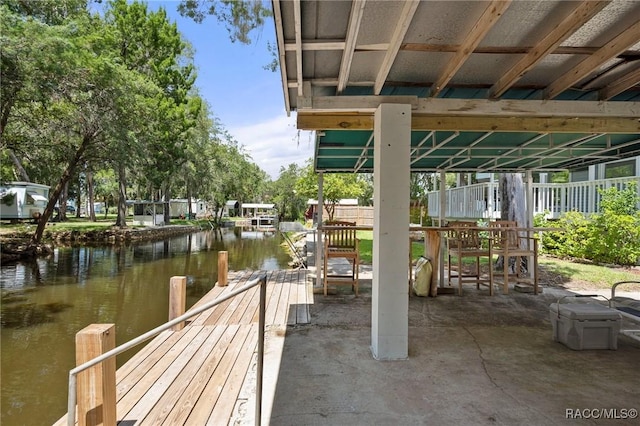 dock area with a water view