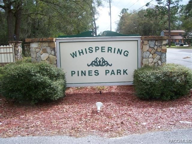 view of community sign