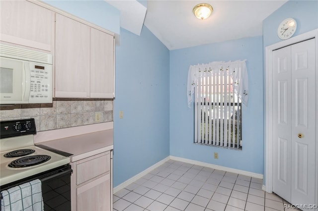 kitchen with decorative backsplash, light brown cabinetry, white appliances, and light tile patterned floors