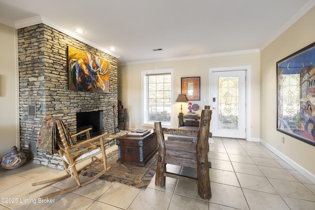 living room with light tile patterned floors, a fireplace, and ornamental molding