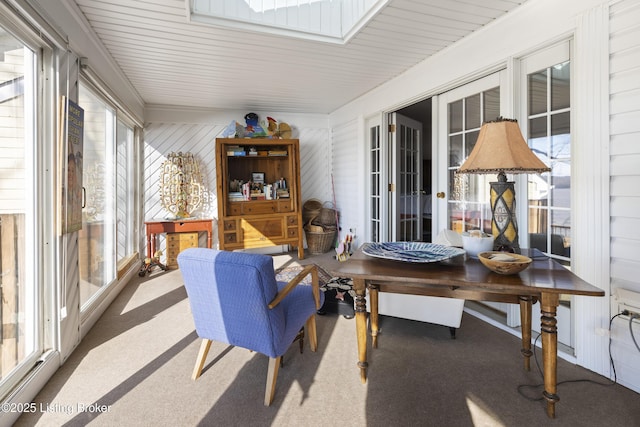 sunroom featuring a skylight