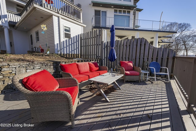 wooden deck with an outdoor hangout area