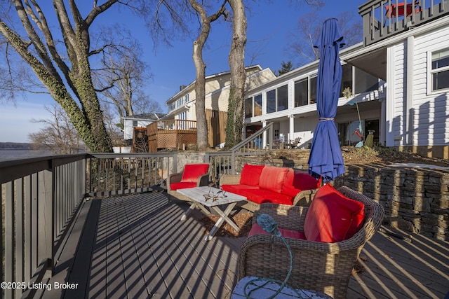 deck featuring outdoor lounge area