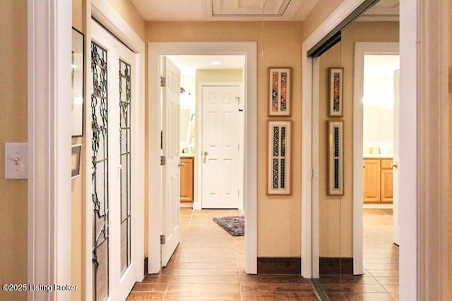 corridor featuring hardwood / wood-style flooring