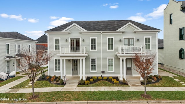 view of front of house with a balcony