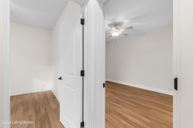 corridor featuring light hardwood / wood-style flooring