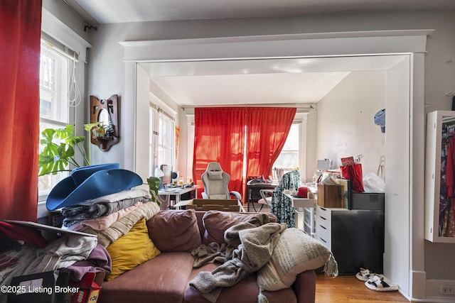 interior space featuring a wealth of natural light and wood finished floors