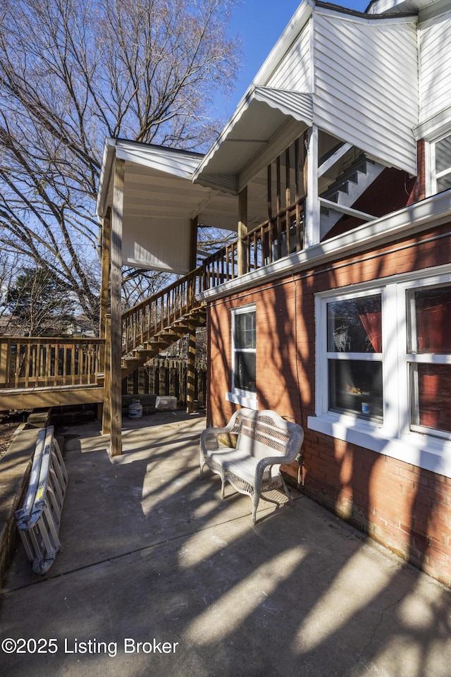 view of patio / terrace featuring stairway