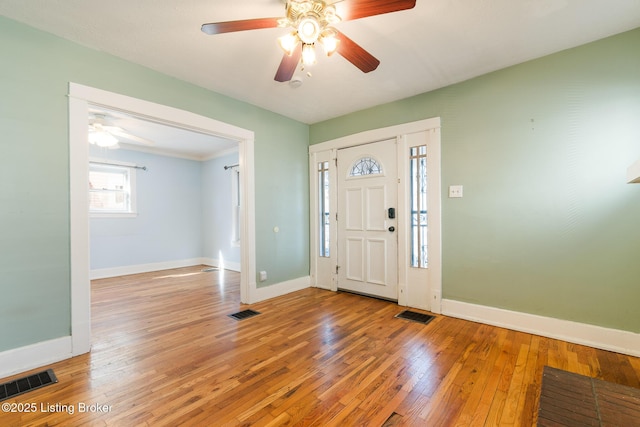 628 Harrison Ave, Louisville, KY 40217 - foyer featuring ceiling fan, light wood finished floors, and baseboards