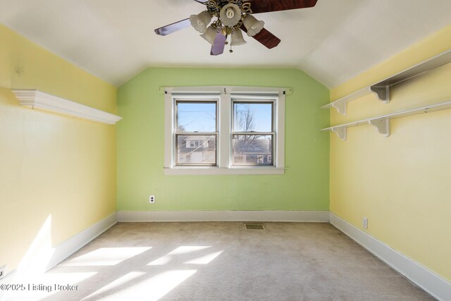 628 Harrison Ave, Louisville, KY 40217 - additional living space with vaulted ceiling, light carpet, ceiling fan, and baseboards
