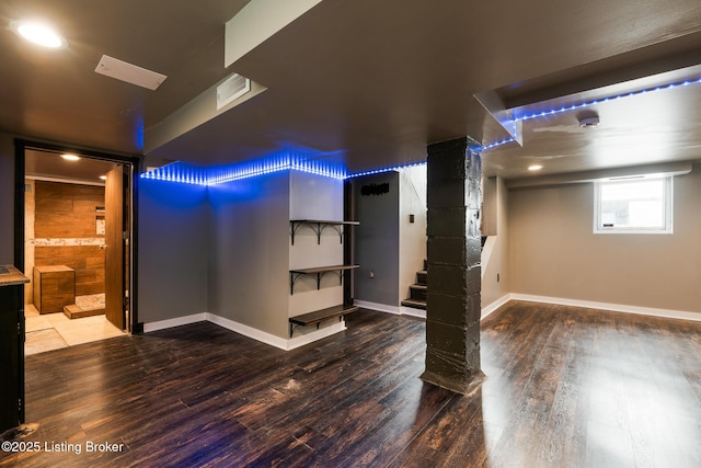 628 Harrison Ave, Louisville, KY 40217 - basement with wood finished floors, baseboards, and stairway