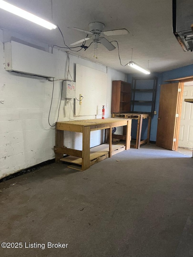 628 Harrison Ave, Louisville, KY 40217 - below grade area with a workshop area, a ceiling fan, and concrete block wall
