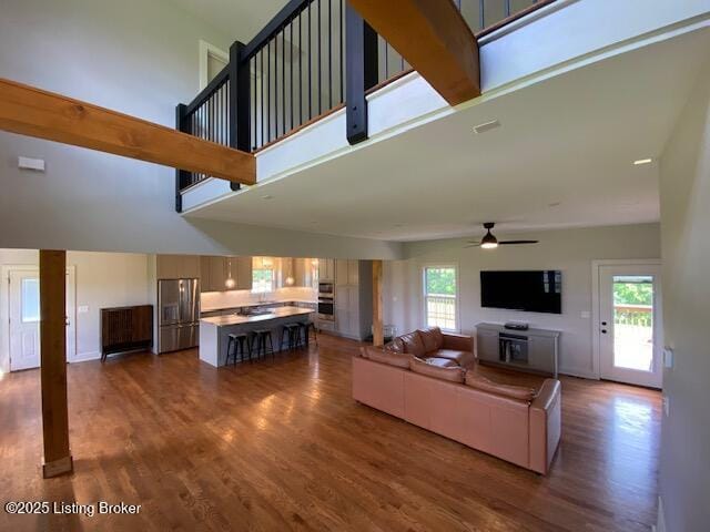 300 Sadie Ln, Bardstown, KY 40004 - living room with ceiling fan, a high ceiling, dark wood finished floors, plenty of natural light, and baseboards