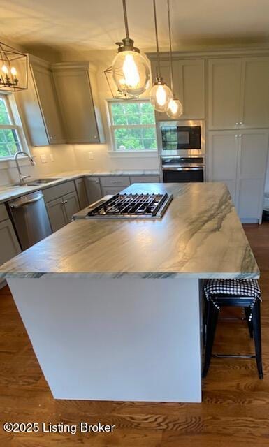 300 Sadie Ln, Bardstown, KY 40004 - kitchen featuring stainless steel appliances, a sink, a chandelier, a center island, and dark wood-style flooring