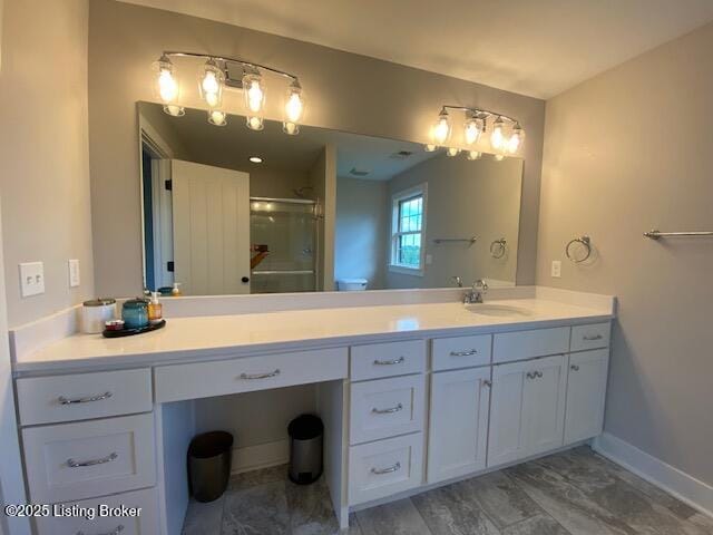 300 Sadie Ln, Bardstown, KY 40004 - bathroom featuring double vanity, a shower stall, and baseboards