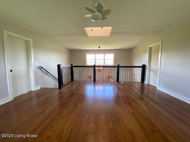 300 Sadie Ln, Bardstown, KY 40004 - spare room featuring wood finished floors, ceiling fan, and baseboards