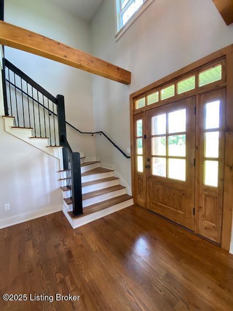 300 Sadie Ln, Bardstown, KY 40004 - entryway featuring stairs, baseboards, wood finished floors, and a high ceiling