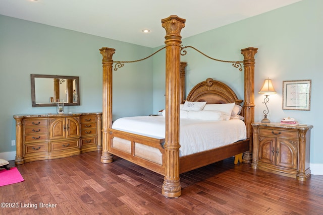 bedroom featuring dark hardwood / wood-style floors