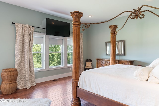 bedroom featuring dark wood-type flooring