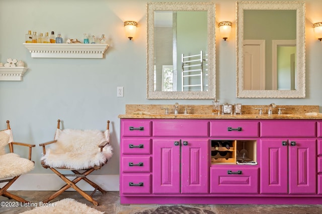 bathroom with tile floors and dual vanity