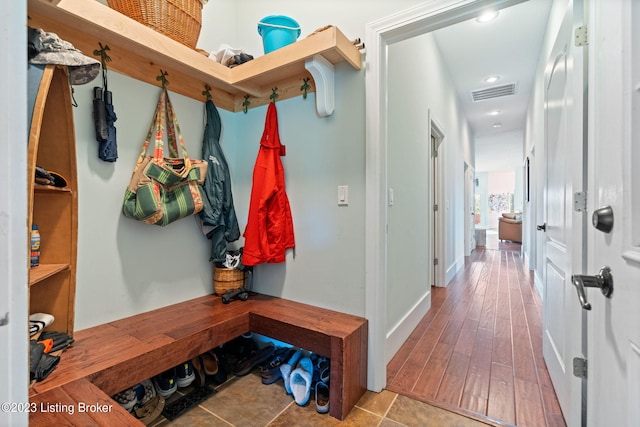 mudroom with hardwood / wood-style floors