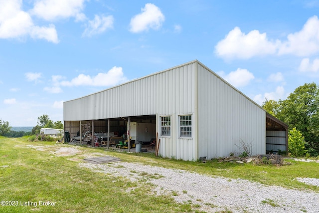 view of shed / structure with a lawn