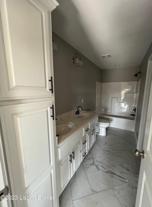 full bathroom with toilet, shower / washtub combination, tile floors, and dual bowl vanity