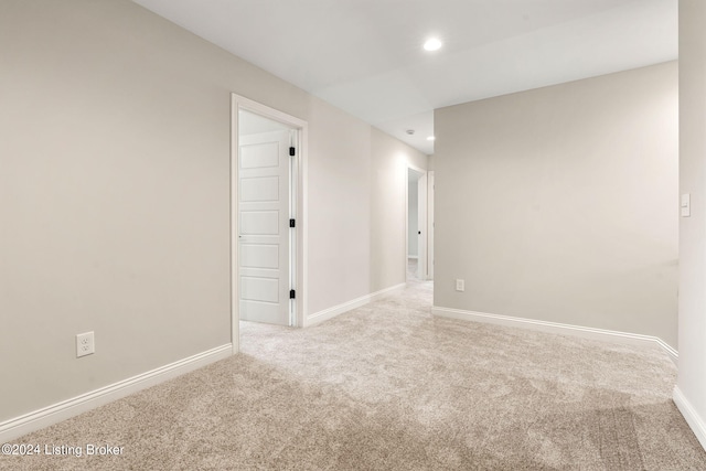 unfurnished room featuring baseboards, carpet flooring, and recessed lighting