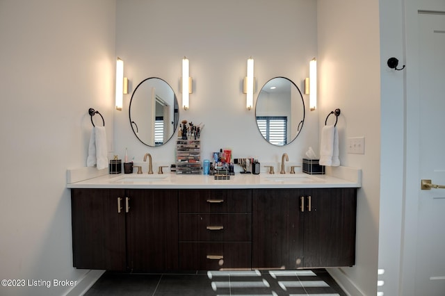 bathroom with vanity and tile patterned floors