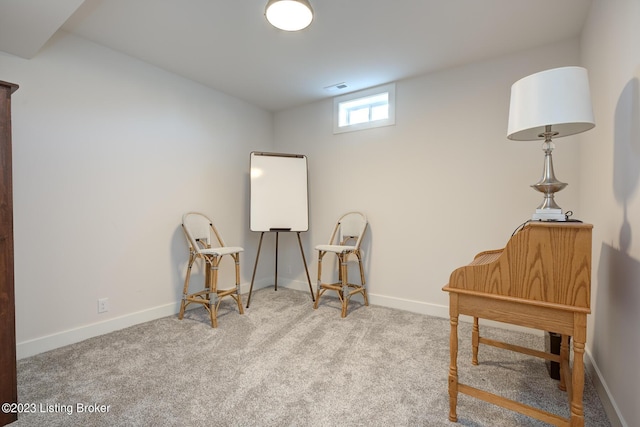 living area with light carpet