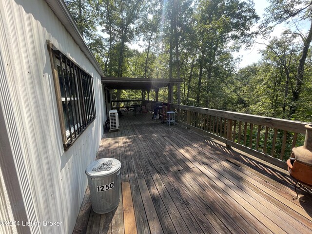 wooden terrace with central AC unit