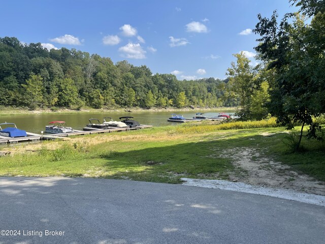 property view of water featuring a boat dock