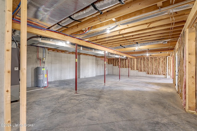 basement featuring electric water heater