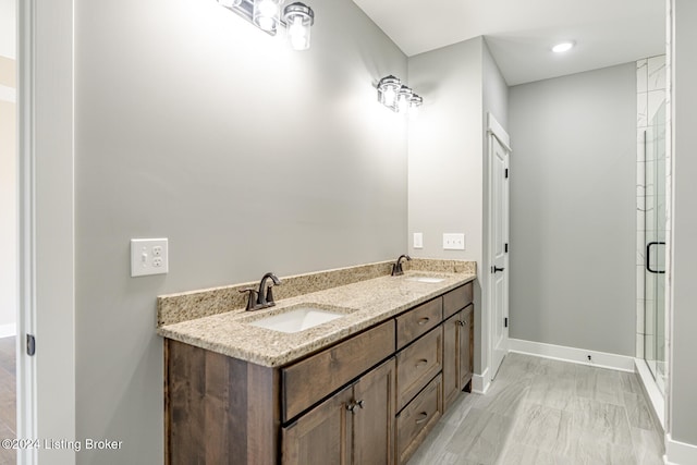 bathroom featuring vanity and walk in shower