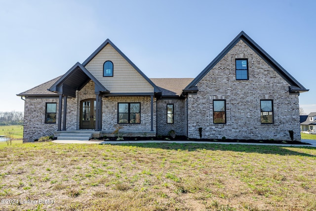 view of front of property with a front yard